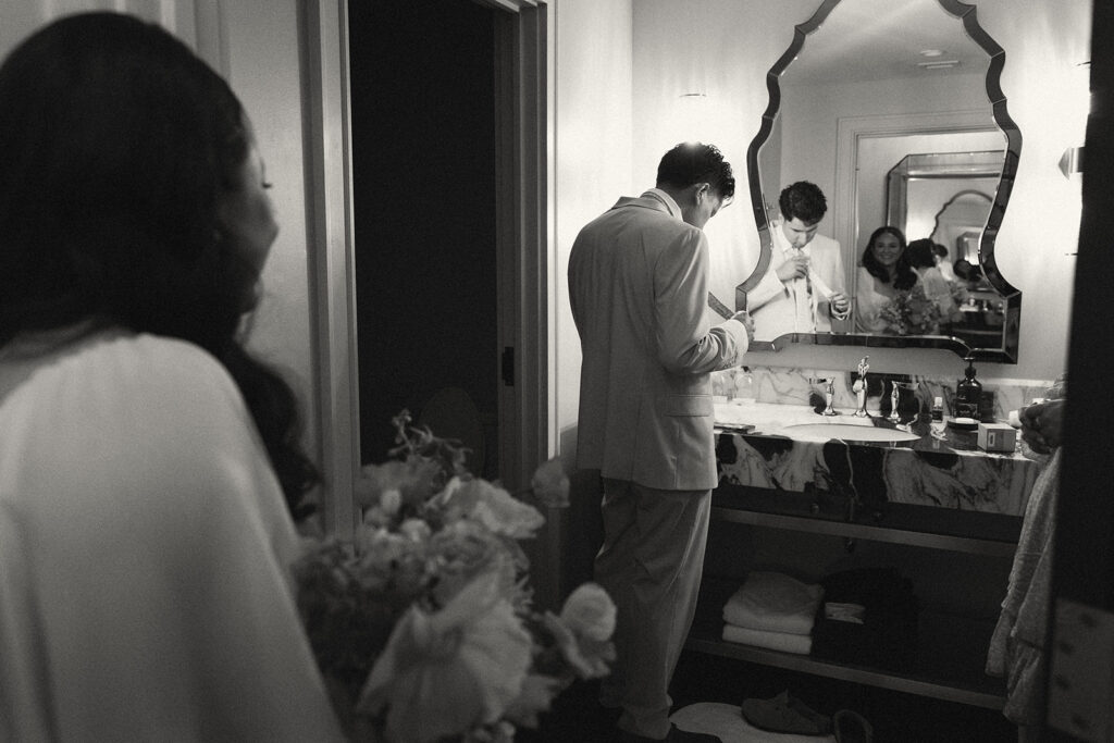 bride and groom getting ready