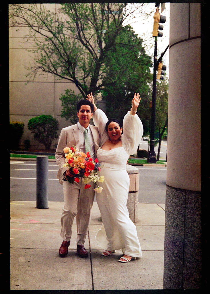 bride and groom Outside the Mecklenberg Courthouse